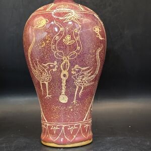 Beautiful Chinese porcelain vase with gold color Phoenix